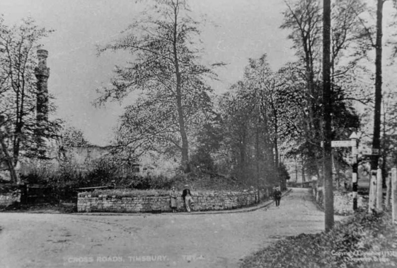 Coalpit Crossroads in the 1920s. The crenellated chimney of Upper Conygre Colliery can be seen. It was designed that way to make it acceptable to the inhabitants of Timsbury House. The tres on the right of Upper Conygre Colliery were also grown to provide a screen for Timsbury House.