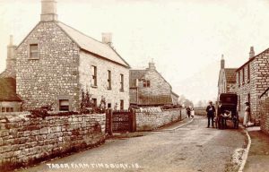 View looking east along North Road with Tabor Farm on the left.