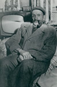 Ernest Ashley in Geoffrey Curtis' house at Bloomfield after the fire in his house.