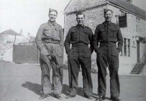 The Welsh Guards were stationed in Timsbury in 1940. Here standing outside The New Inn (The Guss and Crook).