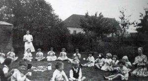 Evacuees from East End of London in 1940 at a tea party at Mrs Perrett's house