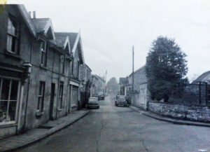 A view along the High Street with not so many cars.