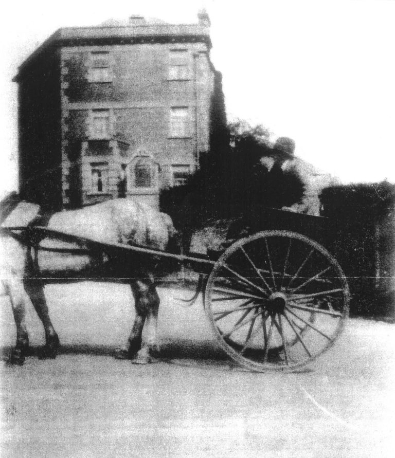 View of Red Brick House on Church Hill. At this time the building has the original extra floor.