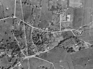 Aerial view of Timsbury, probably dates from 1950s. Remains of Upper Conygre Pit can be seen at crossroads on North Road.